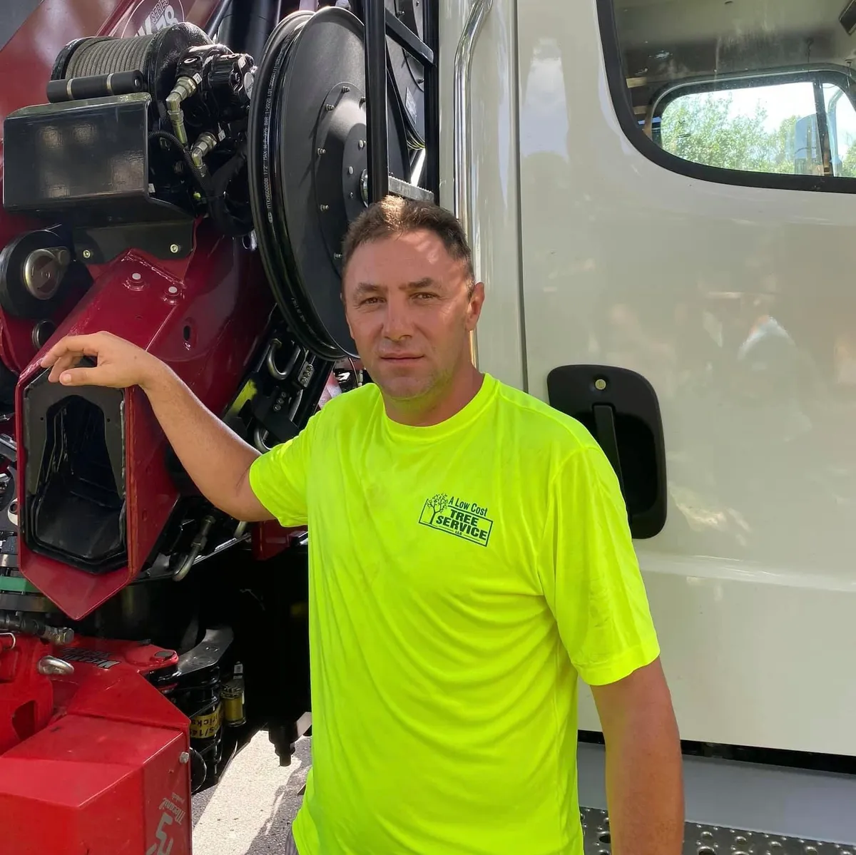 Lucian Fratila, owner of A Low Cost Tree Service